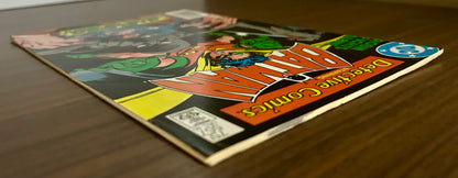 DETECTIVE COMICS #557 [DC COMICS] NEWSSTAND 1985 FN+
